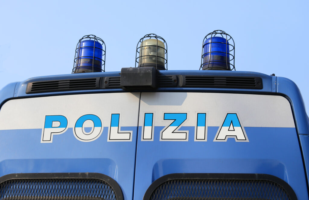 Italian police pickup truck with the big written and blue sirene